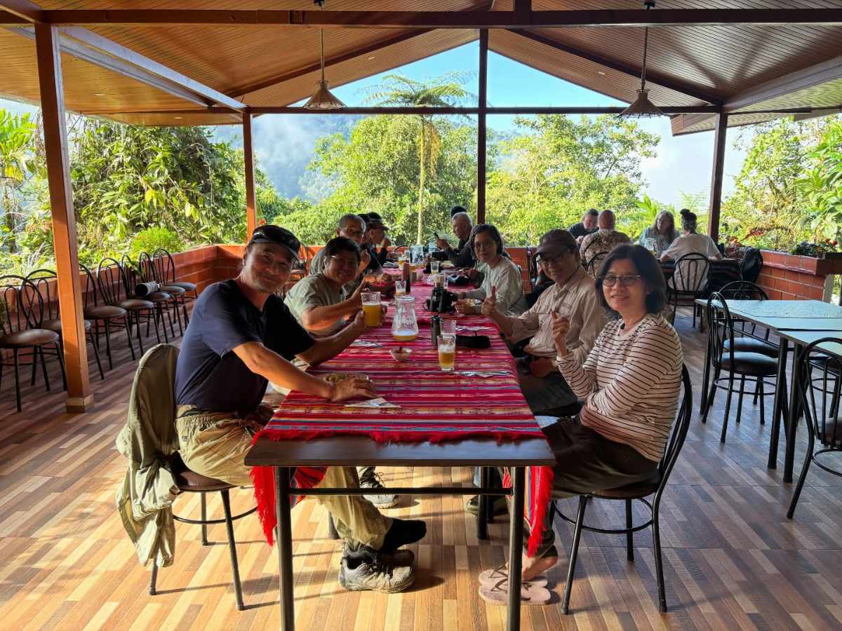 The new dining rooom at Mashpi Amagusa provides covered space in an open air setting with gorgeous views of surrounding gardens with cloud forested mountains in the distance.